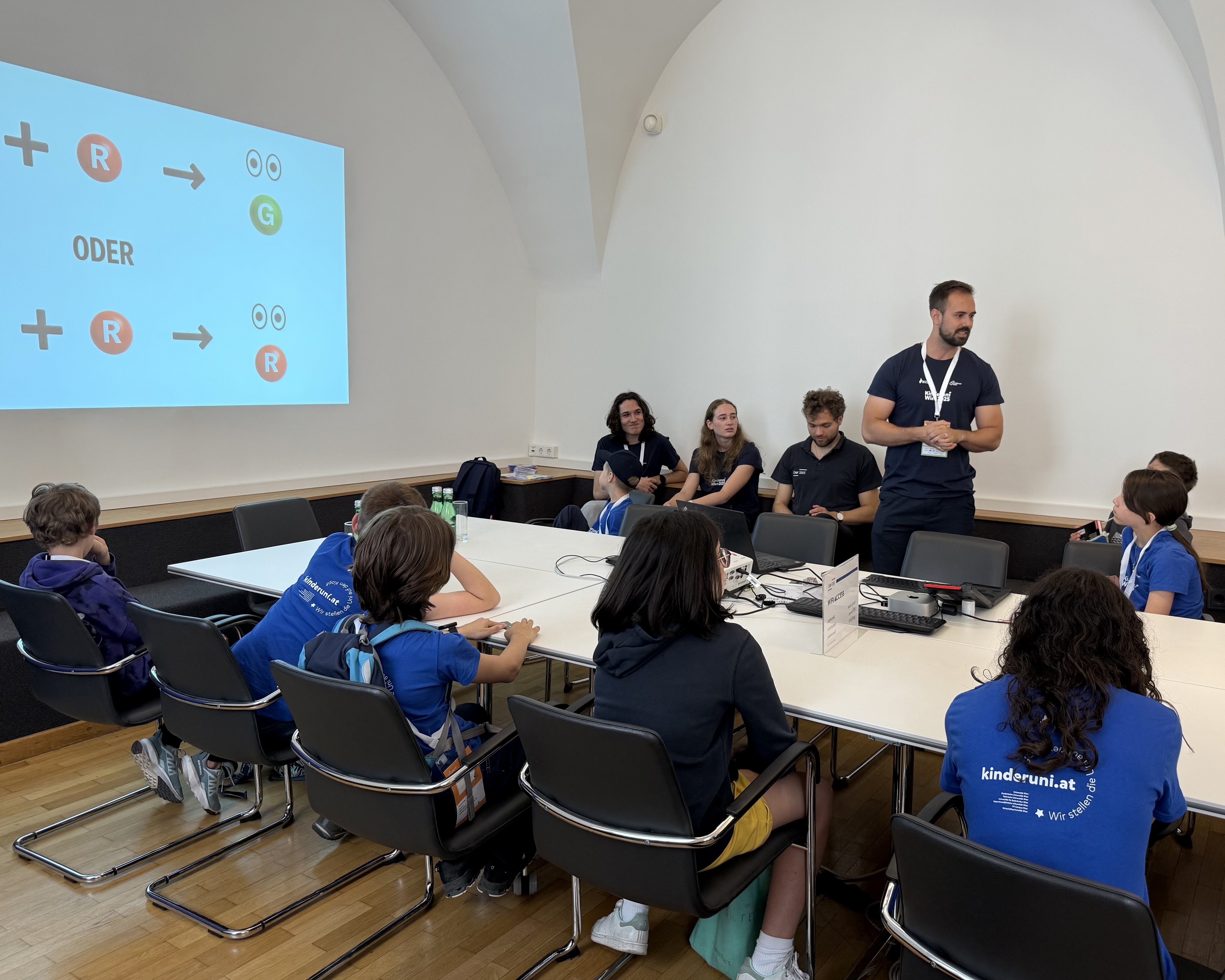Another researcher playing a quantum game with the children