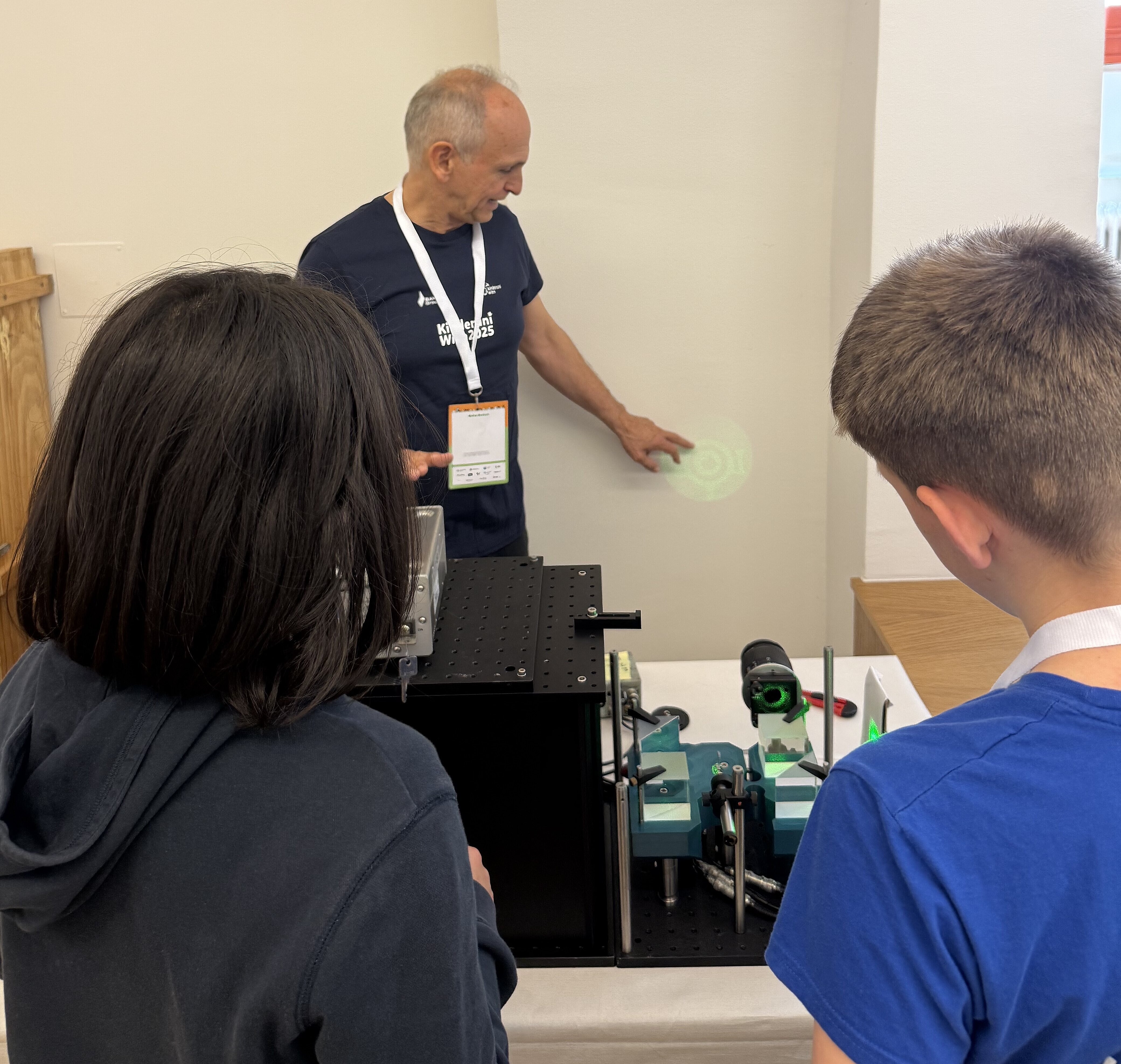 One of our researchers explaining an experiment to a group a children