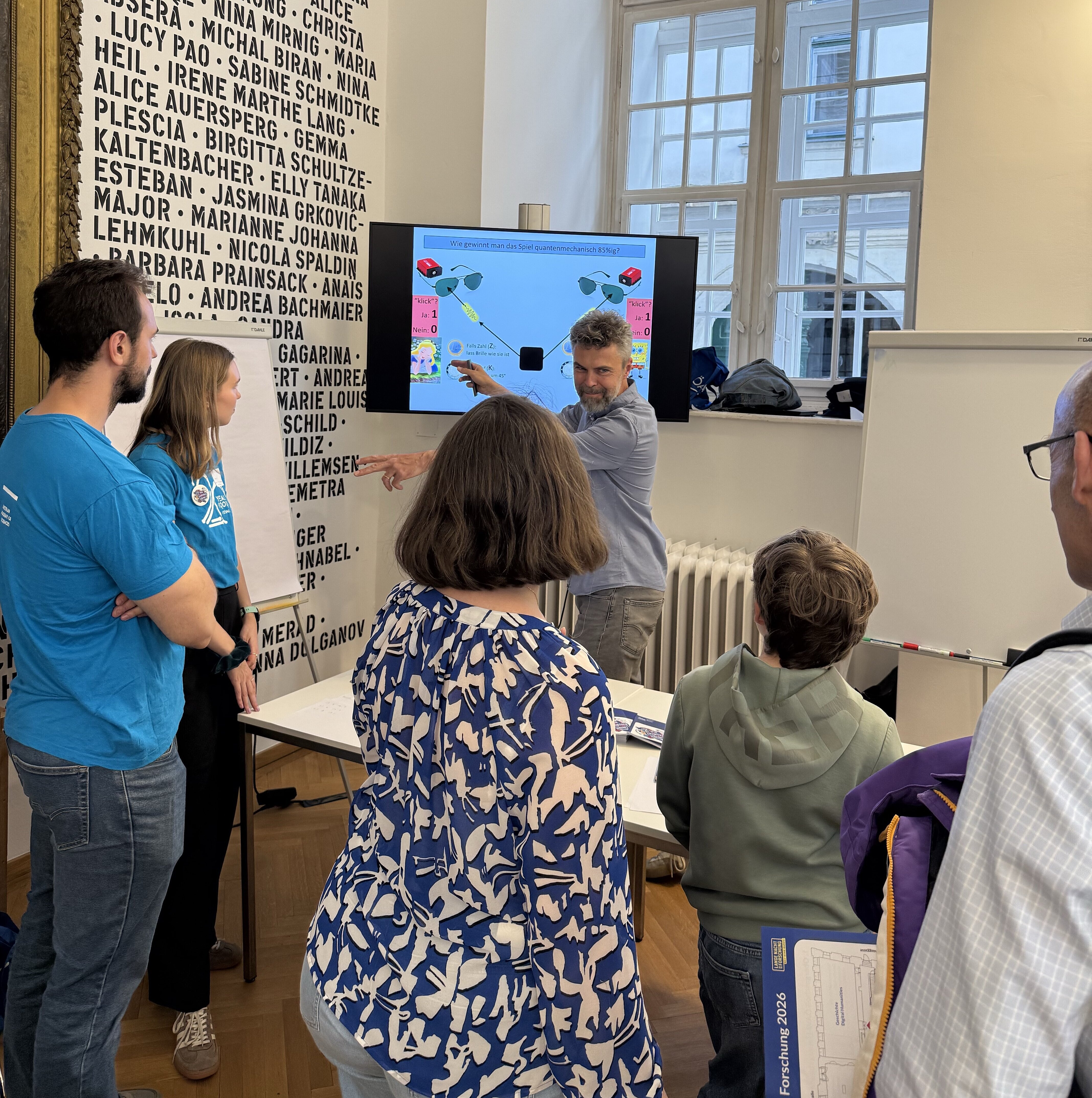 Group leader Markus Müller talking to some visitors