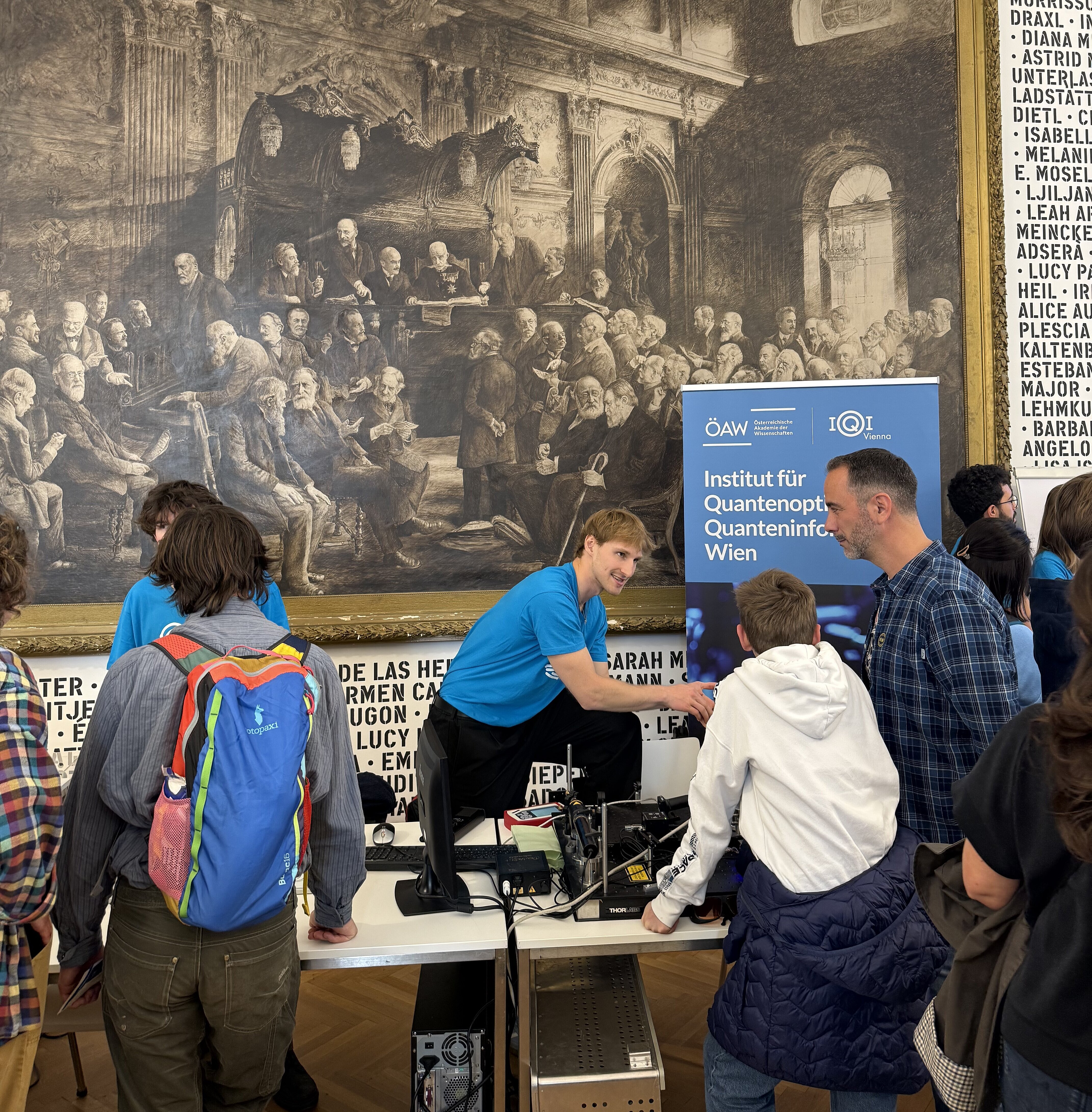 Our scientists engaging in conversation with visitors